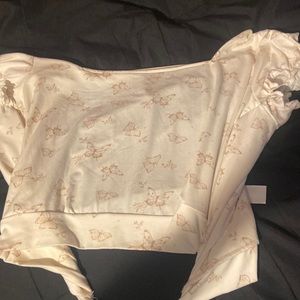 a backless shirt and has never been worn before